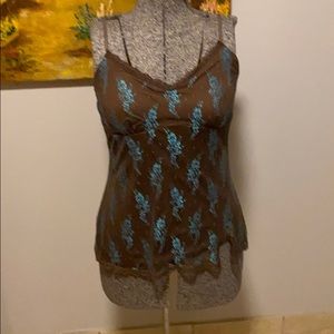 A chocolate brown tank with a lace overlay.